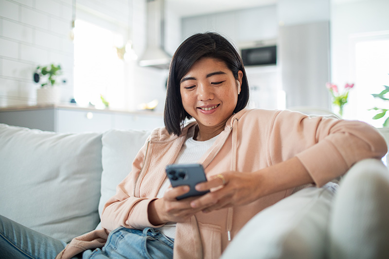 woman holding phone