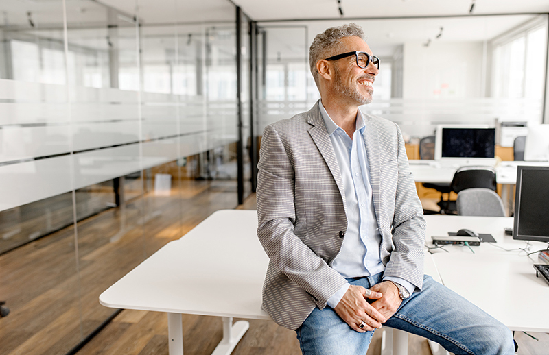 man sitting on desk