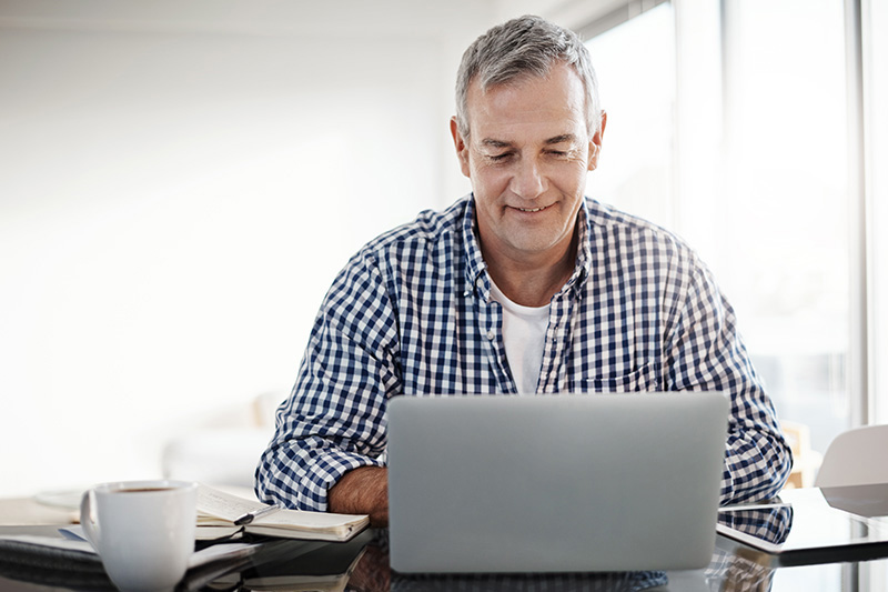 man working on laptop